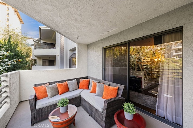 balcony featuring an outdoor hangout area