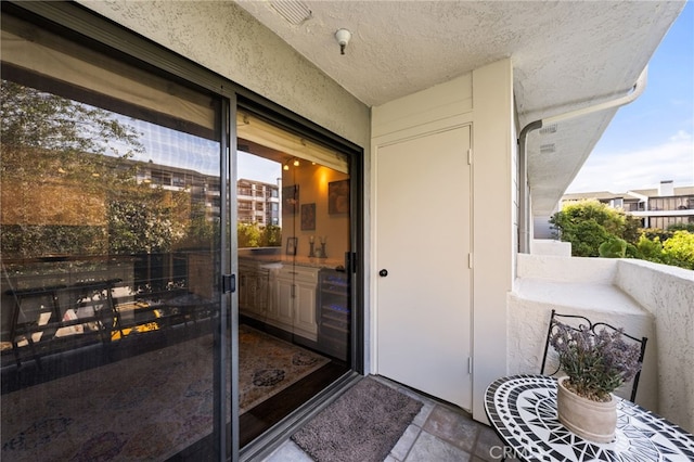 property entrance with a balcony