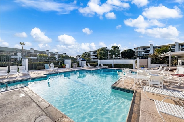 view of pool featuring a patio area