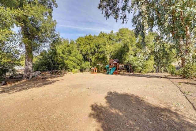 view of yard with a playground