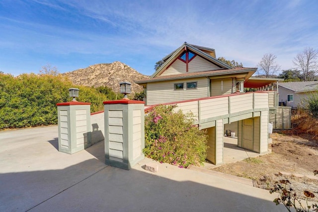 view of front of home with a mountain view