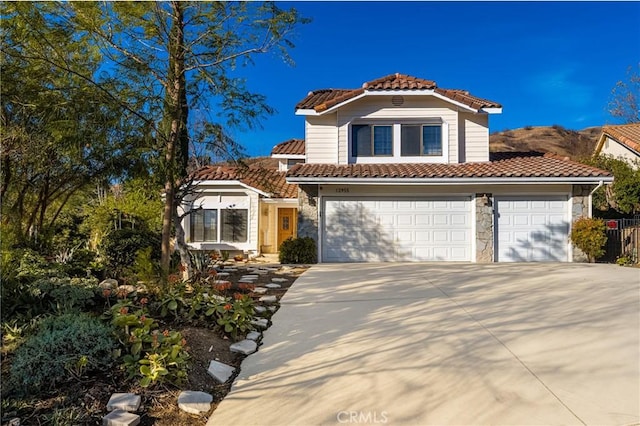 view of front of property with a garage