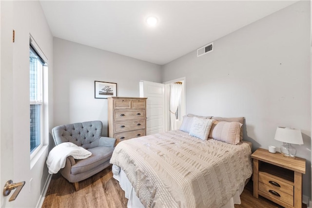 bedroom featuring hardwood / wood-style flooring