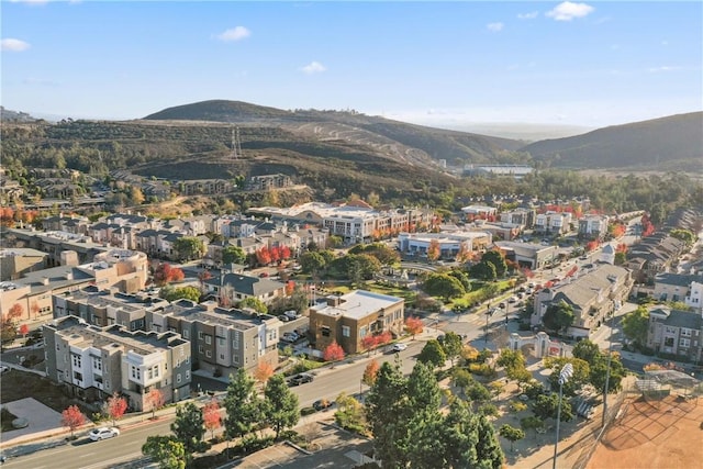 birds eye view of property featuring a mountain view