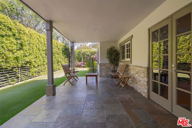 view of patio / terrace featuring french doors