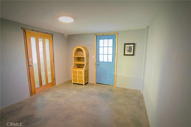 entryway with concrete flooring