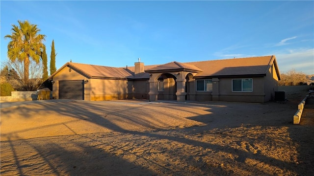 view of front of home with a garage