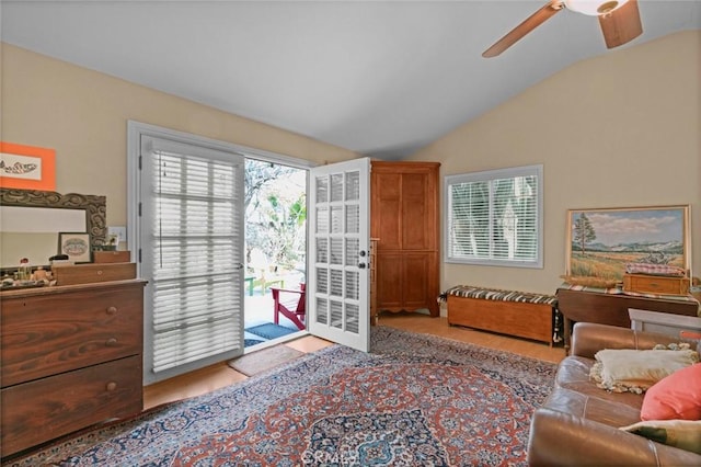 sitting room with vaulted ceiling and ceiling fan