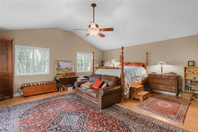 bedroom featuring ceiling fan, lofted ceiling, and light hardwood / wood-style floors