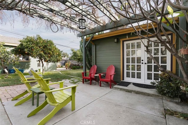 view of patio / terrace featuring a pergola and french doors