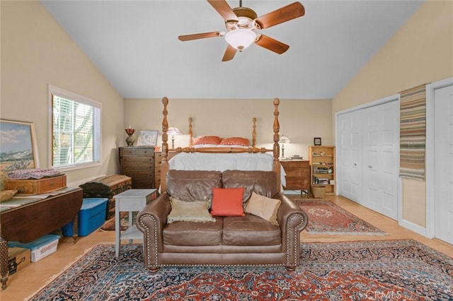 bedroom with vaulted ceiling, ceiling fan, and a closet