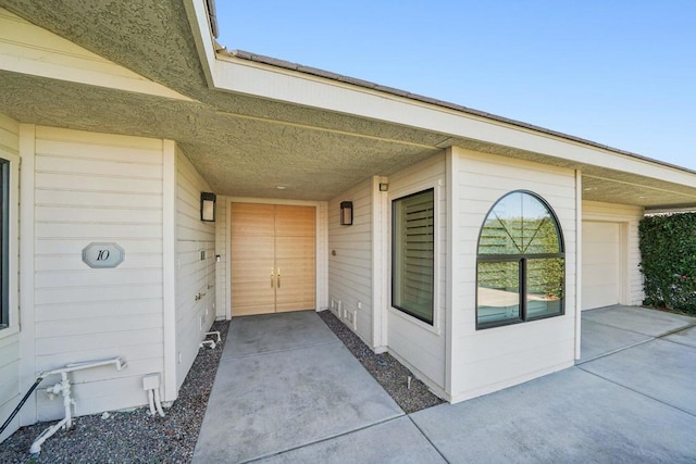 property entrance featuring a garage