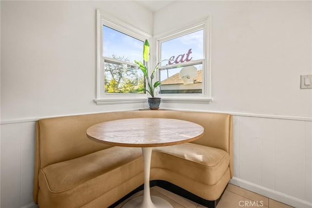 sitting room featuring tile patterned floors