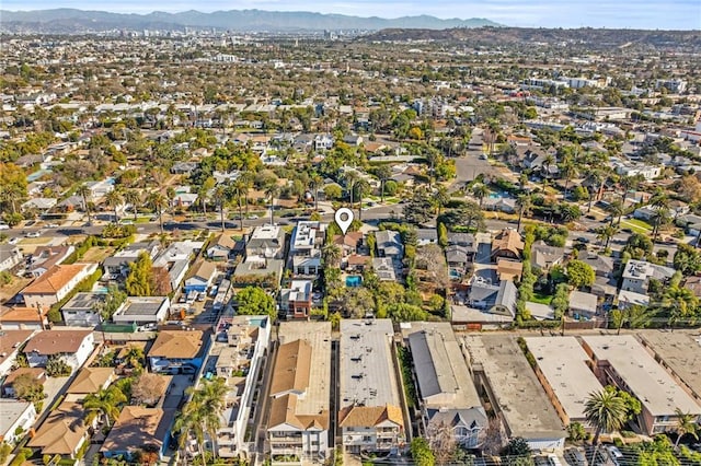 drone / aerial view featuring a mountain view