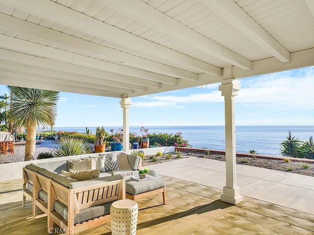 view of patio / terrace featuring an outdoor living space and a water view