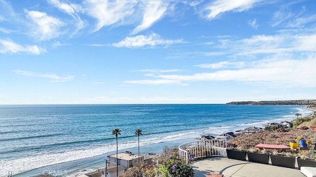 property view of water featuring a beach view