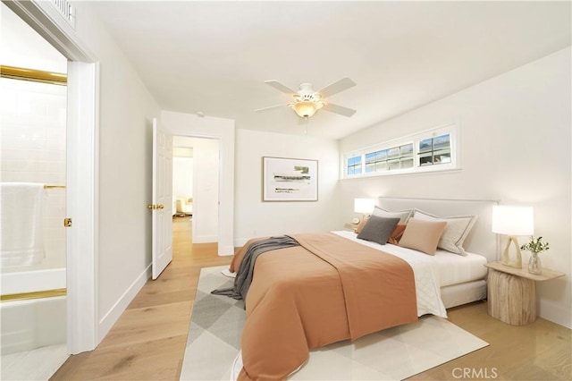 bedroom featuring light wood-type flooring and ceiling fan