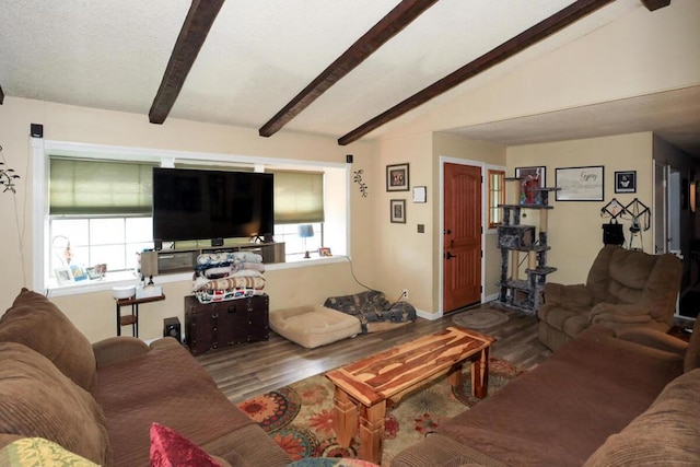 living room with vaulted ceiling with beams and wood-type flooring