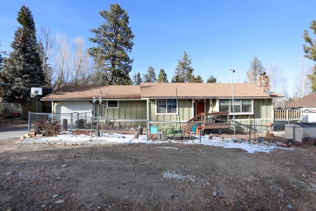 ranch-style home with a garage