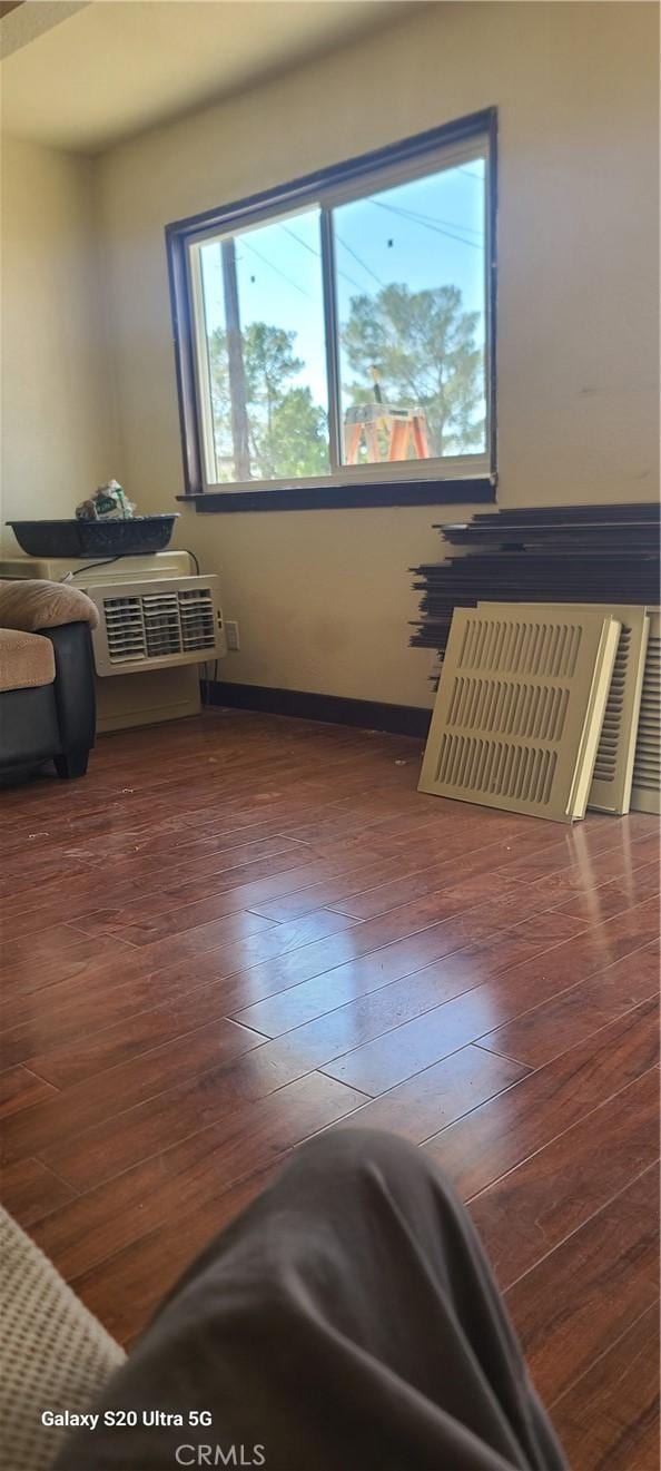 bedroom featuring dark wood-type flooring