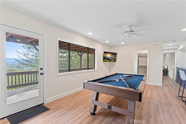 game room featuring light wood-type flooring, ceiling fan, and billiards