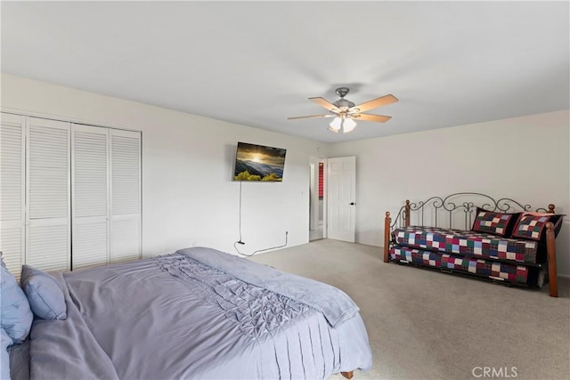 bedroom featuring carpet floors, a closet, and ceiling fan