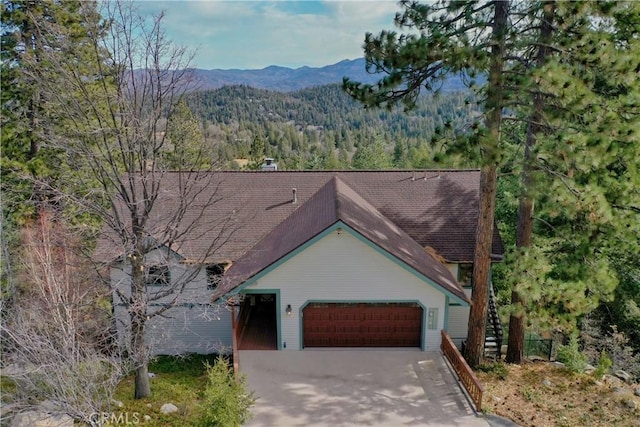 view of front of house featuring a mountain view