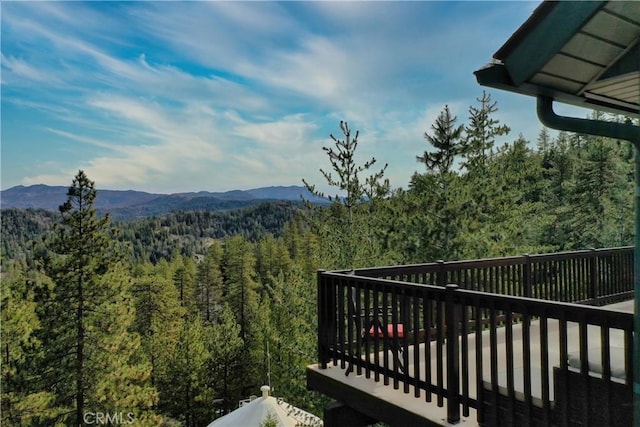 balcony featuring a deck with mountain view