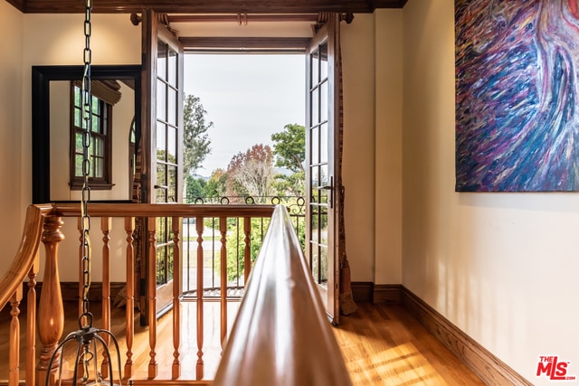 doorway to outside featuring hardwood / wood-style flooring