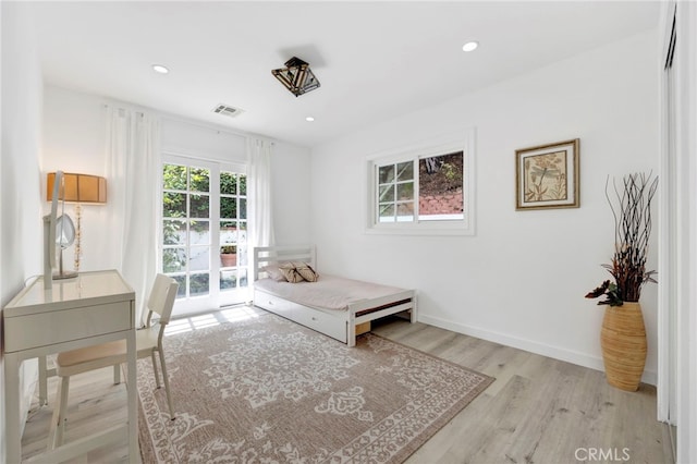 sitting room with light wood-type flooring