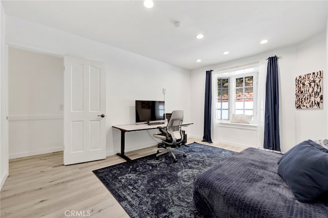 bedroom with light hardwood / wood-style flooring