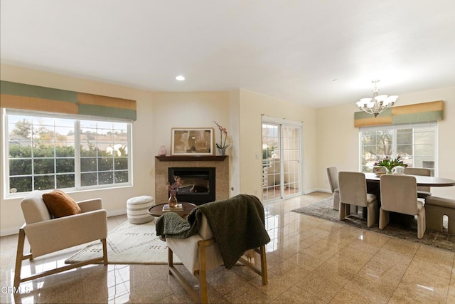 living room featuring a notable chandelier