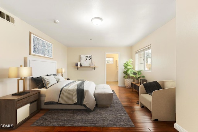 bedroom featuring dark hardwood / wood-style floors