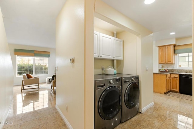 washroom with washing machine and dryer