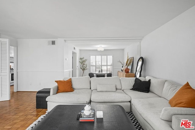 living room with parquet flooring