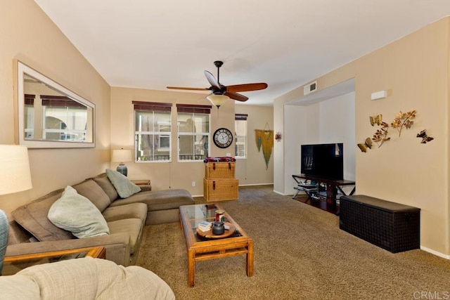 carpeted living room featuring ceiling fan