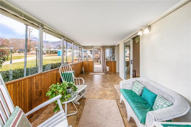 sunroom featuring plenty of natural light