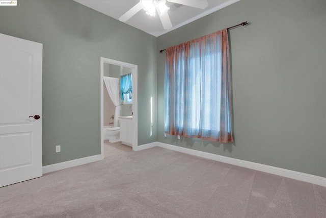 carpeted empty room with ceiling fan