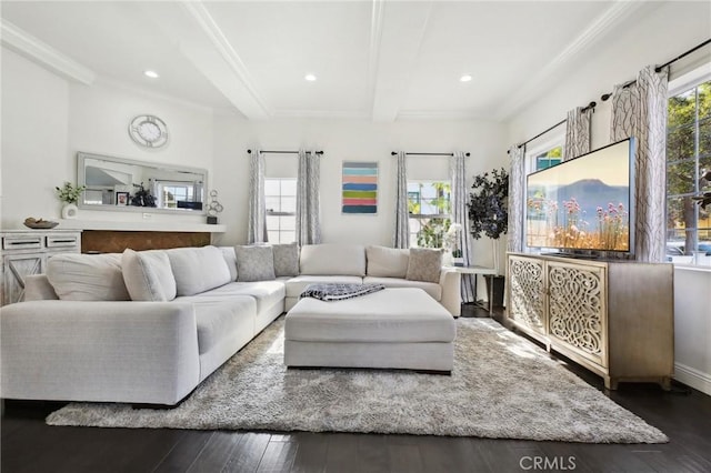 living area with recessed lighting, beam ceiling, a healthy amount of sunlight, and hardwood / wood-style floors