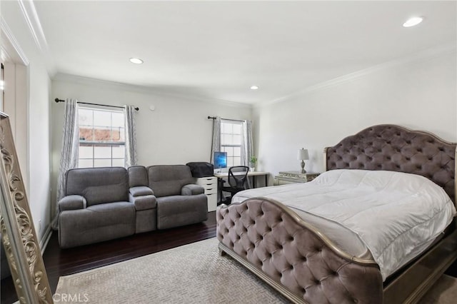 bedroom featuring multiple windows, ornamental molding, and dark hardwood / wood-style floors