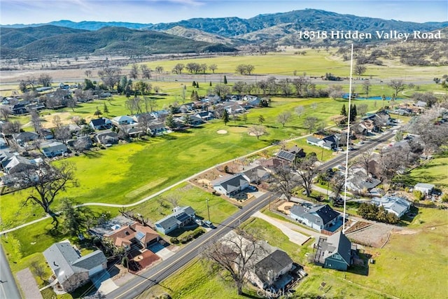 aerial view featuring a residential view and a mountain view