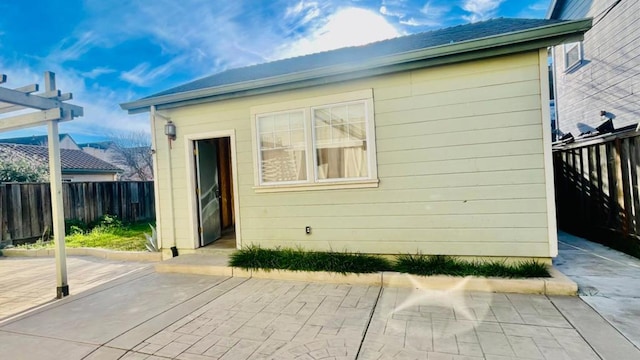 rear view of house with a patio area