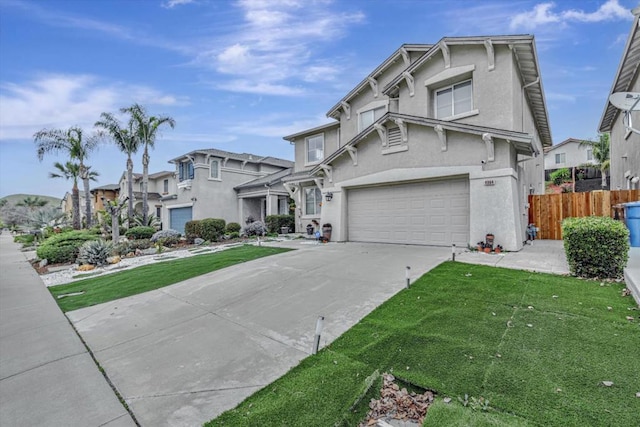 view of front property with a garage and a front lawn