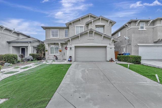 view of front of home with a garage and a front lawn