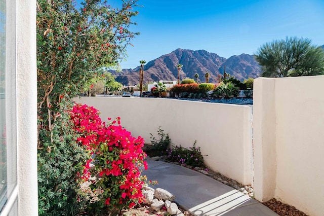 view of patio / terrace featuring a mountain view