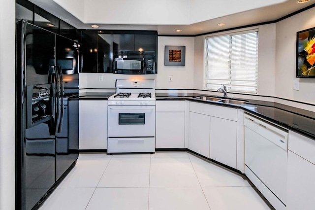 kitchen featuring sink, light tile patterned floors, white cabinets, and black appliances