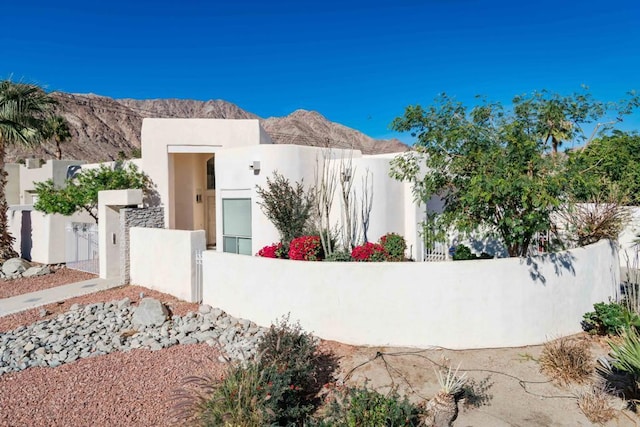 view of home's exterior with a mountain view