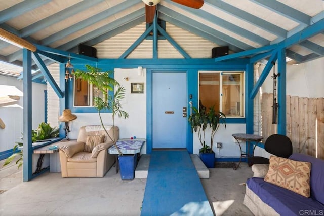 doorway to property with a patio area and an outdoor living space