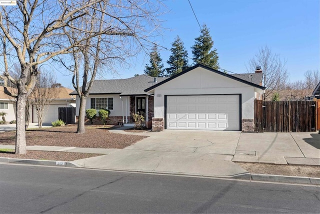 ranch-style home featuring a garage