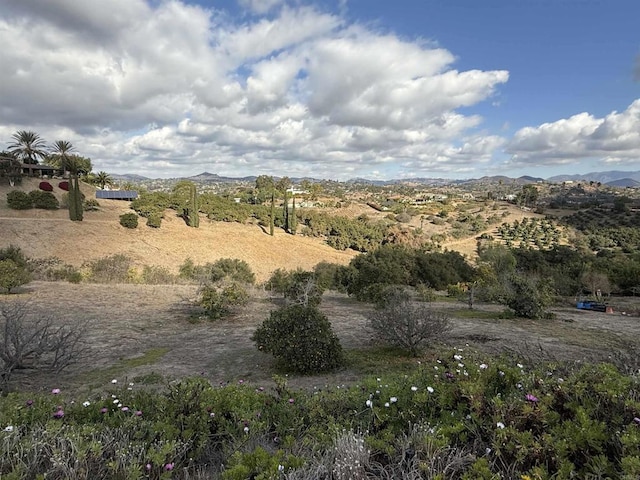 mountain view featuring a rural view